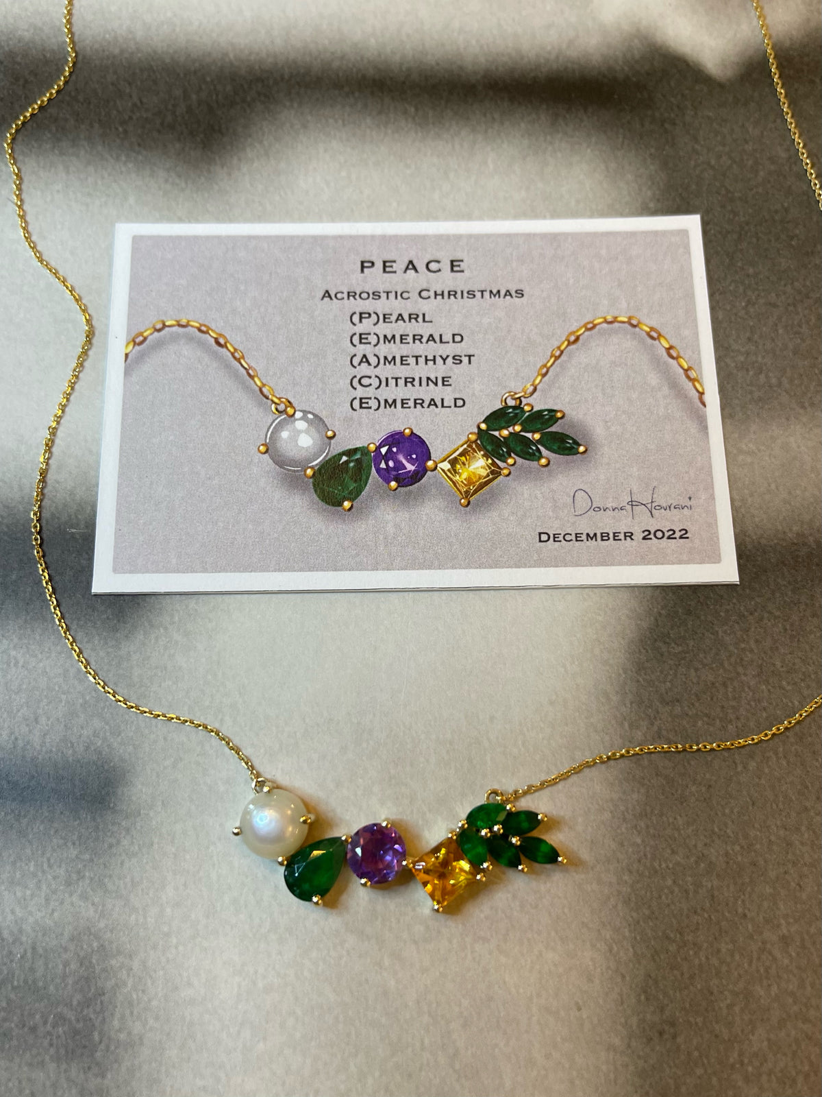  18k yellow gold necklace, featuring pearls, emeralds, amethyst
